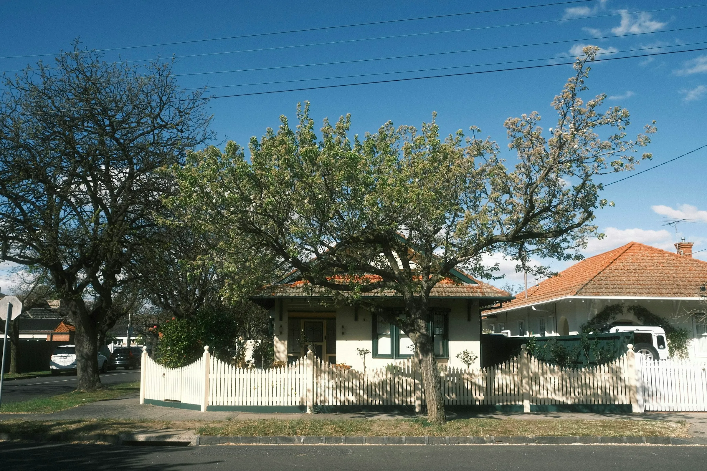 An Australian suburban home with a front lawn, the kind of residential property held as security under a registered mortgage
